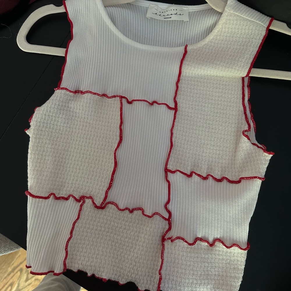 White with red trim tank